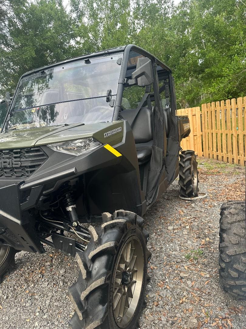Off-road UTV with large mud tires